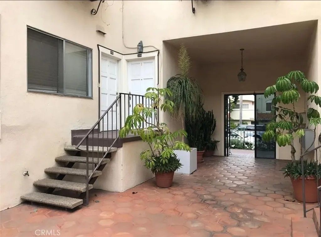 Photo of 1951 Malcolm, Los Angeles, CA 90025 (MLS # SR26011797)