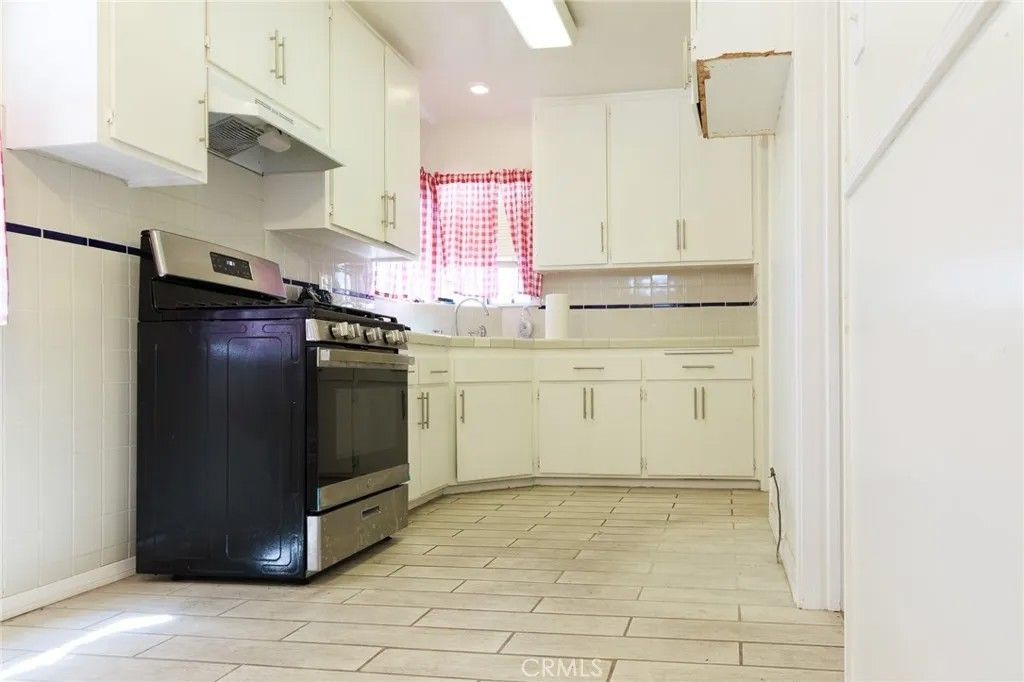 Photo of 8847 Ruthelen St, Los Angeles, CA 90047 (MLS # SB26090135)