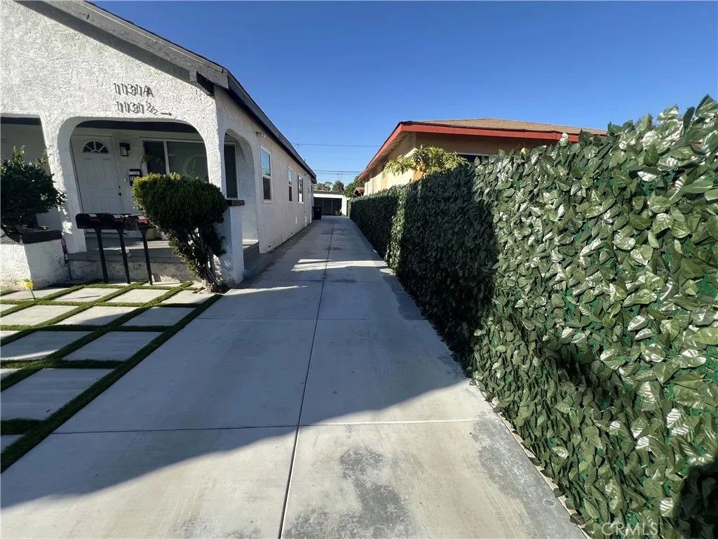 Photo of 1131 E 21st St, Long Beach, CA 90806 (MLS # DW26066239)