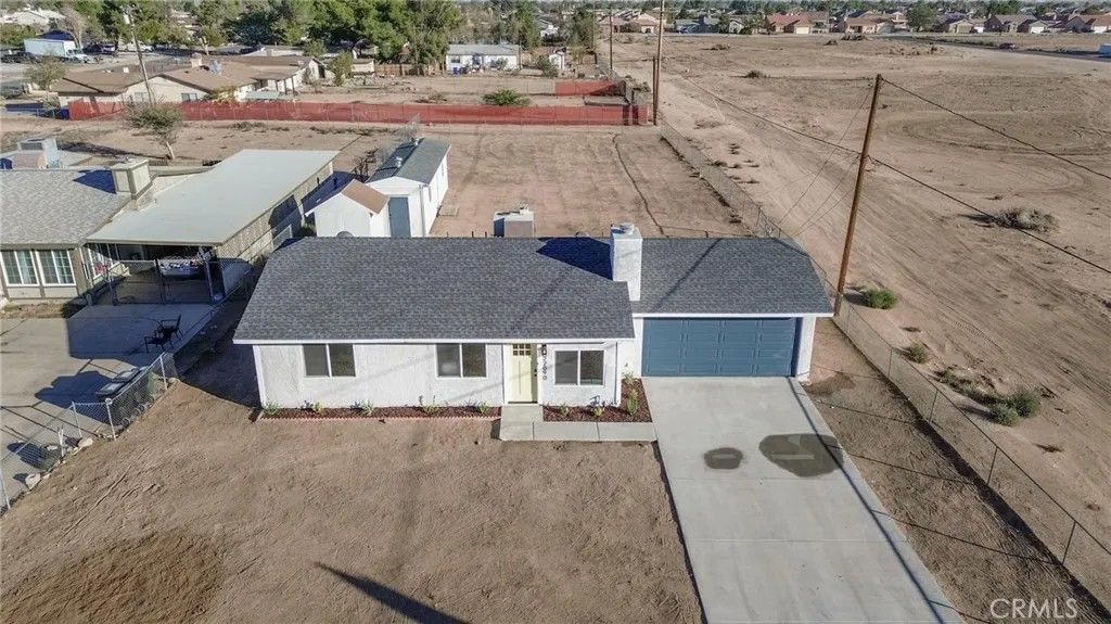 Photo of 22090 Cherokee Avenue, Apple Valley, CA 92307 (MLS # HD25251245)