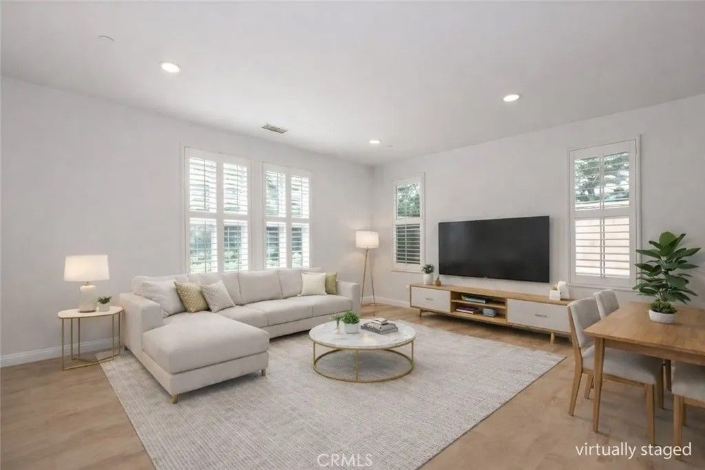 Photo of 115 Hollow Tree, Irvine, CA 92618 (MLS # OC26001710)