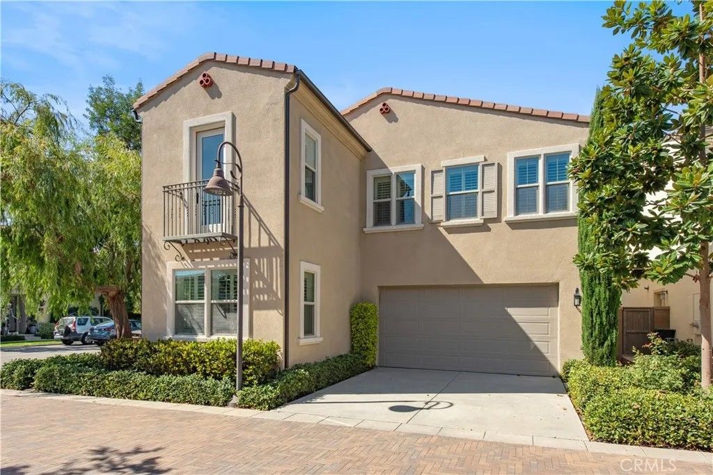 Photo of 115 Hollow Tree, Irvine, CA 92618 (MLS # OC26001710)