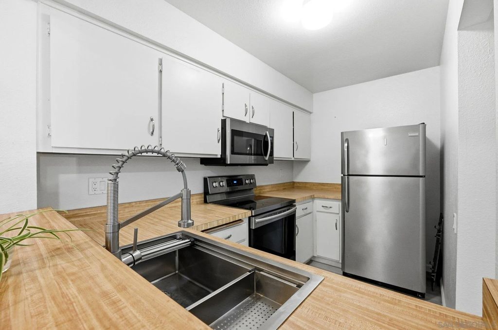 Photo of 8019 Caminito De Pizza #B, San Diego, CA 92108 (MLS # 260004322)