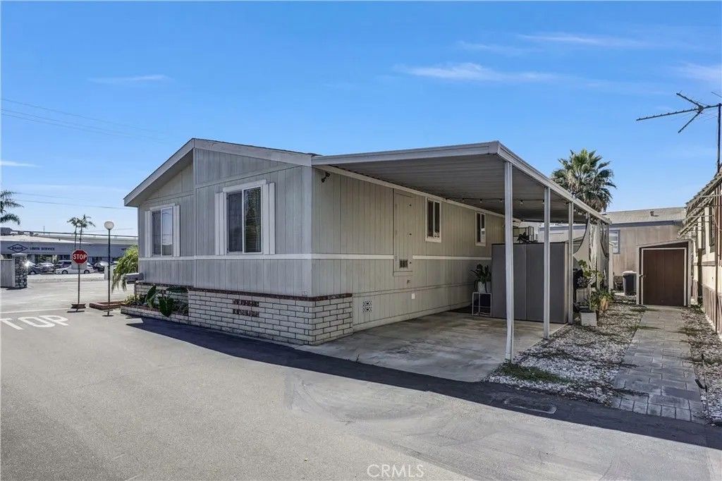 Photo of 16511 Garfield Ave #B4, Paramount, CA 90723 (MLS # RS25274357)