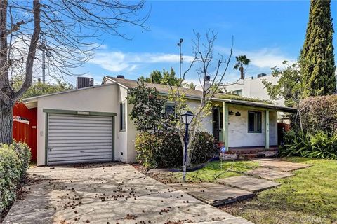 Photo of 3035 Malcolm Ave, Los Angeles, CA 90034 (MLS # OC26056638)