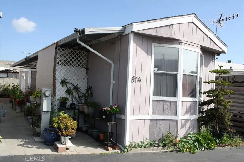 Photo of 16950 Gramercy Pl #81A, Gardena, CA 90247 (MLS # SB26031597)