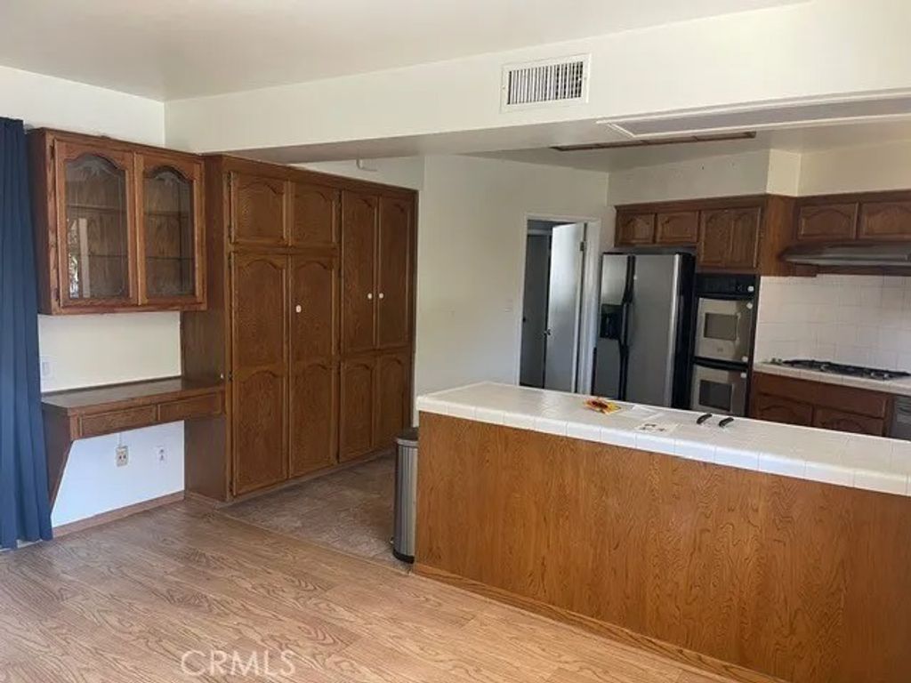 Photo of 200 Sleepy Hollow Terrace, Glendale, CA 91206 (MLS # GD26021808)