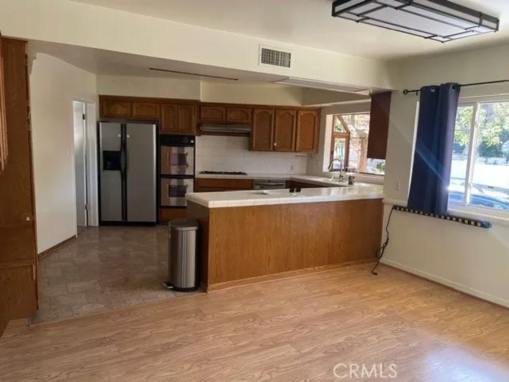 Photo of 200 Sleepy Hollow Terrace, Glendale, CA 91206 (MLS # GD26021808)