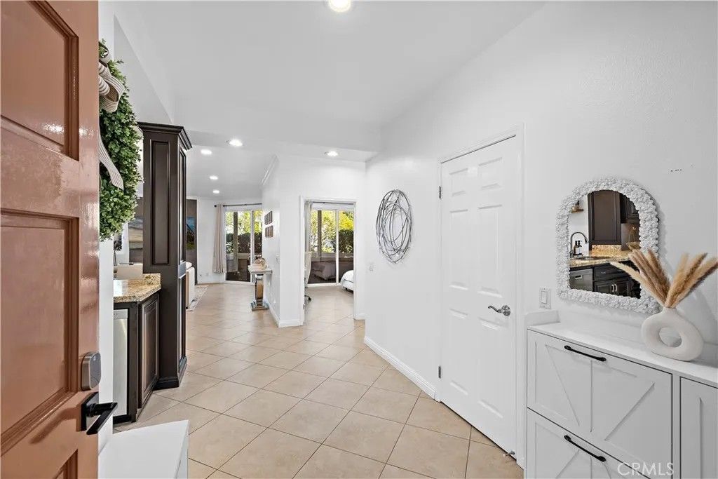 Photo of 19442 Sunray Ln #103 Ln, Huntington Beach, CA 92648 (MLS # OC26090638)