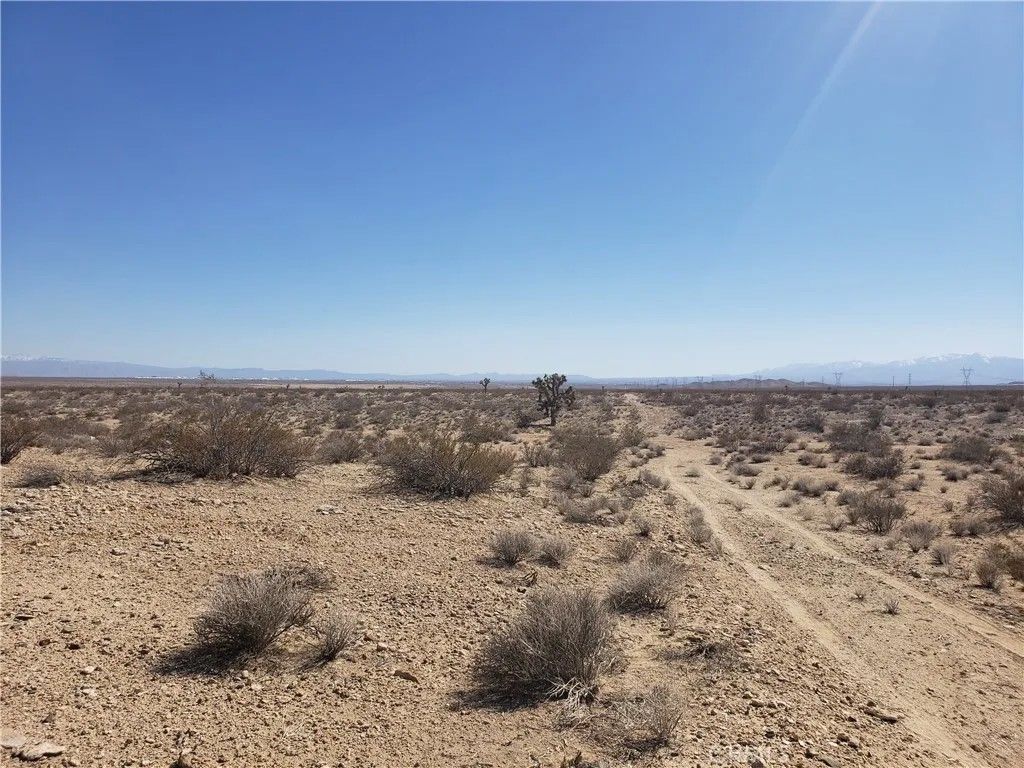 Photo of 0 0460-291-24-0000 Bannock Rd, Adelanto, CA 92301 (MLS # CV26012598)