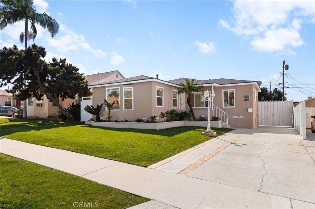 Photo of 2046 W 112th St, Los Angeles, CA 90047 (MLS # CV26054412)