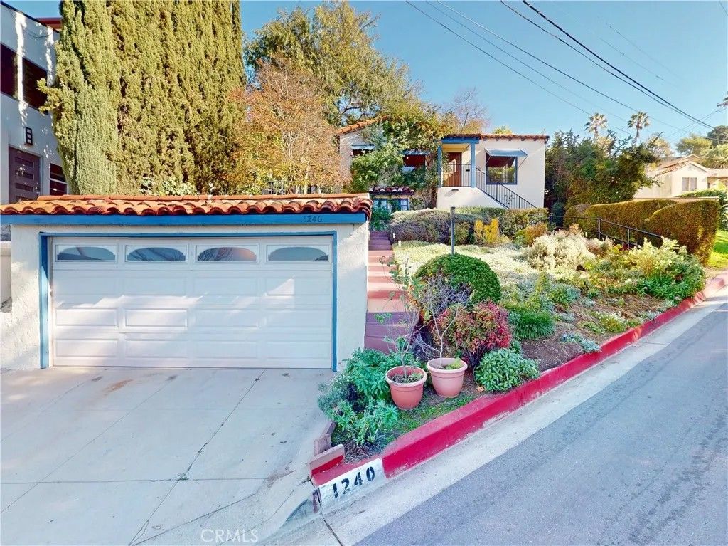 Photo of 1240 Marion Drive, Glendale, CA 91205 (MLS # PF25265258)