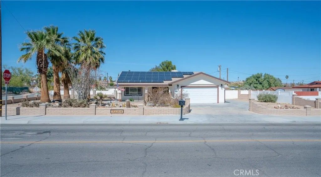 Photo of 73254 El Paseo, 29 Palms, CA 92277 (MLS # JT26056077)