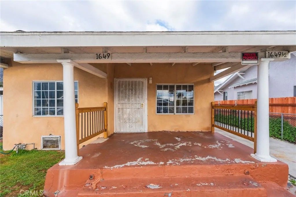 Photo of 1649 W 56th Street, Los Angeles, CA 90062 (MLS # OC25263941)