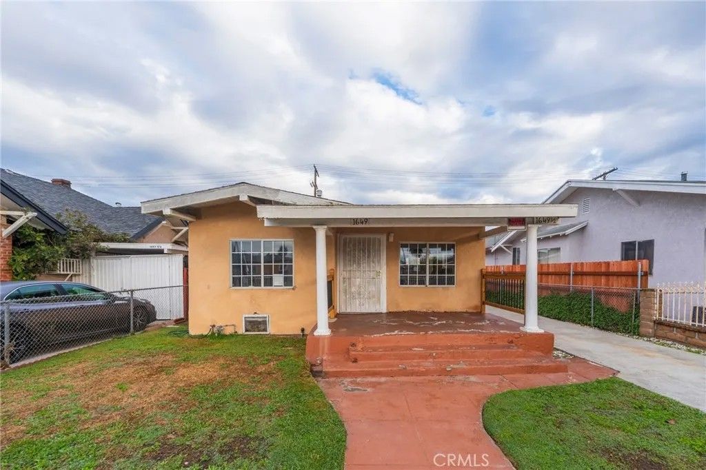 Photo of 1649 W 56th Street, Los Angeles, CA 90062 (MLS # OC25263941)