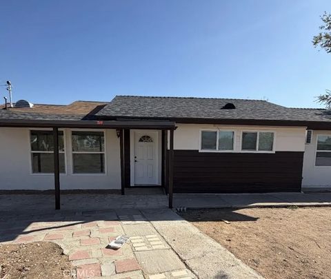 Photo of 10723 5th Ave, Hesperia, CA 92345 (MLS # CV25252596)