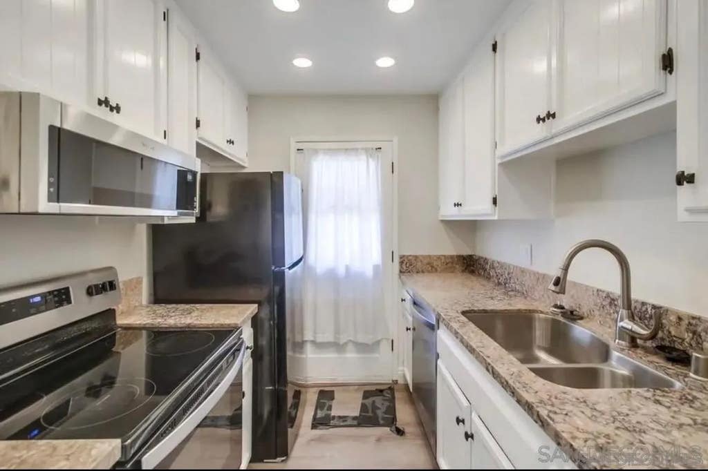 Photo of 12115 Wintergreen Dr #4, Lakeside, CA 92040 (MLS # 260019771)