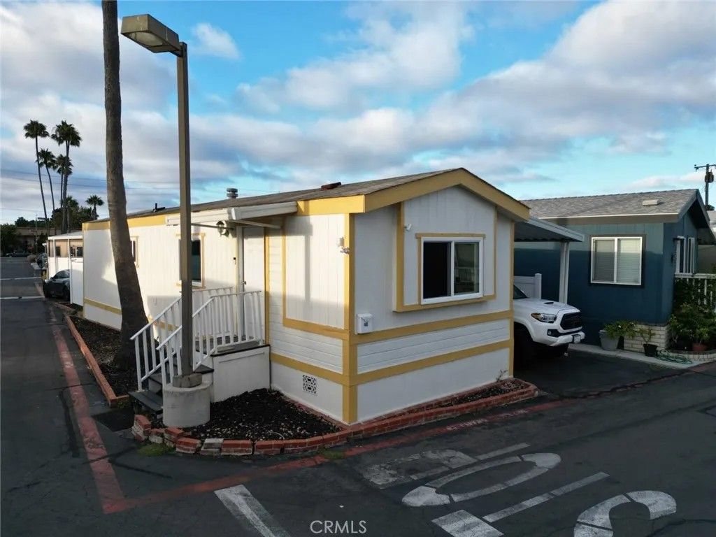 Photo of 7652 Garfield Ave #40, Huntington Beach, CA 92648 (MLS # OC25276144)