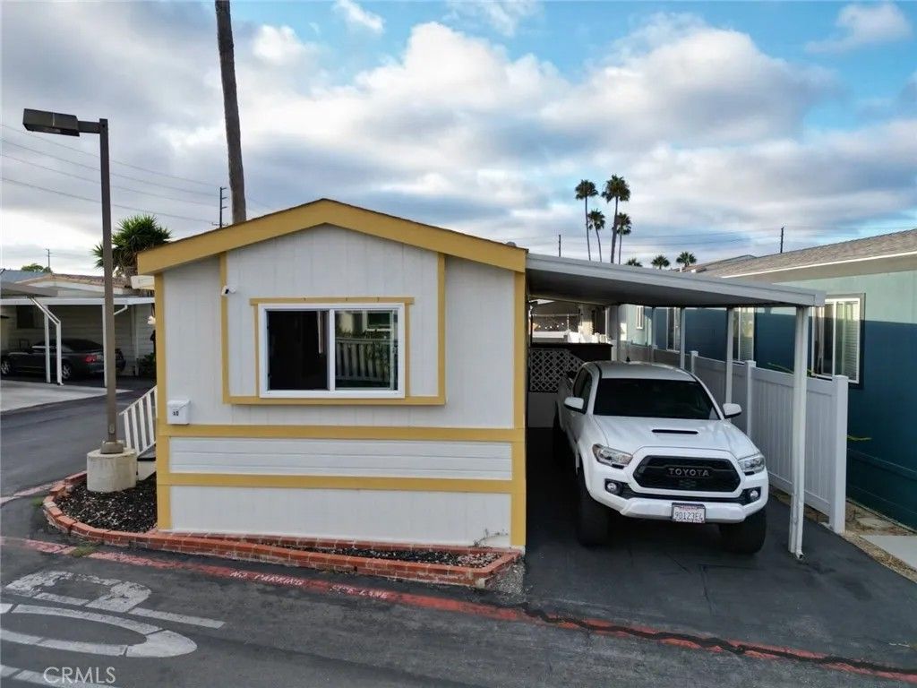 Photo of 7652 Garfield Ave #40, Huntington Beach, CA 92648 (MLS # OC25276144)