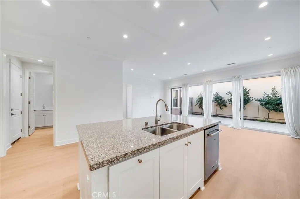 Photo of 64 Meander, Irvine, CA 92620 (MLS # OC25268546)