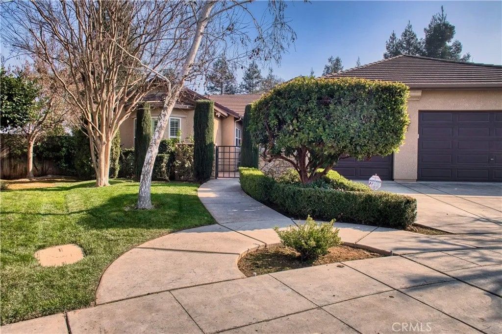 Photo of 6009 W Goux Ave, Fresno, CA 93722 (MLS # MD26027835)