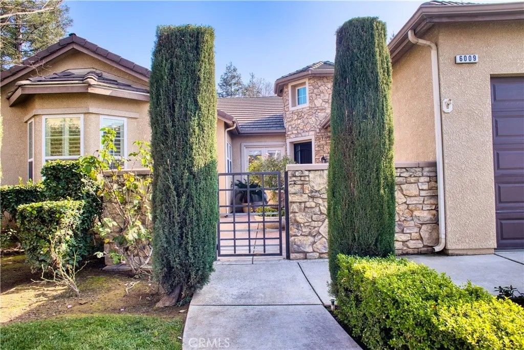 Photo of 6009 W Goux Ave, Fresno, CA 93722 (MLS # MD26027835)