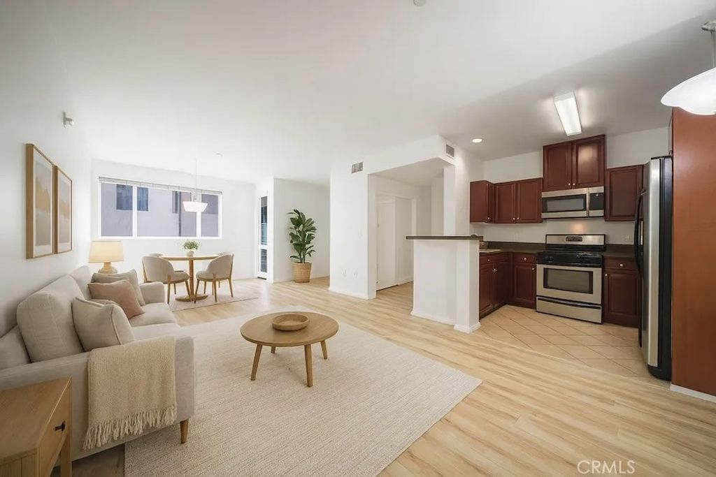 Photo of 13941 Sherman Way #205, Van Nuys, CA 91405 (MLS # OC26057612)