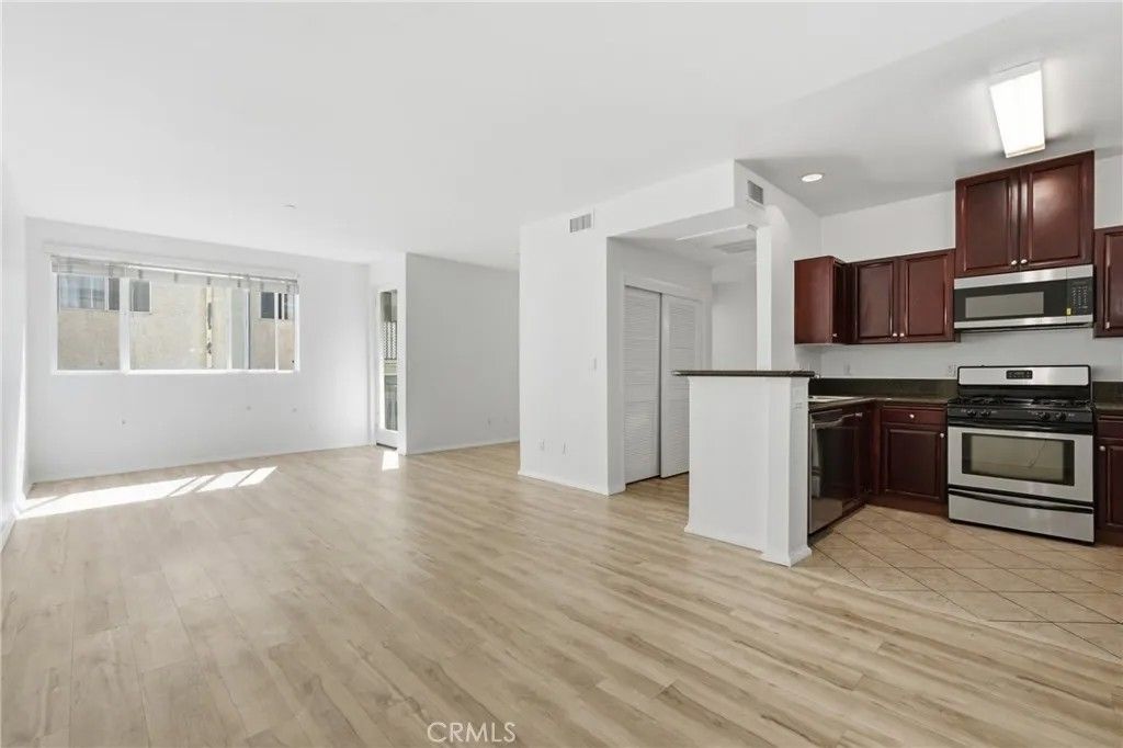 Photo of 13941 Sherman Way #205, Van Nuys, CA 91405 (MLS # OC26057612)