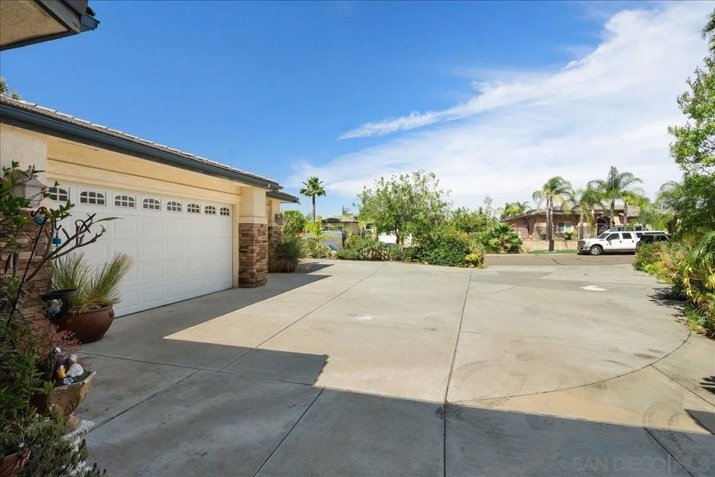 Photo of 8861 Diamondback Dr, Santee, CA 92071 (MLS # 260008757)