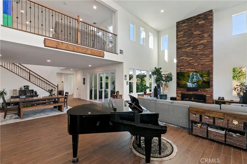 Photo of 1411 Sallie Jeffreys Way, Corona, CA 92881 (MLS # IG26014849)