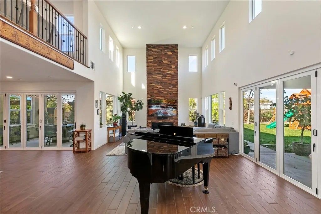 Photo of 1411 Sallie Jeffreys Way, Corona, CA 92881 (MLS # IG26014849)