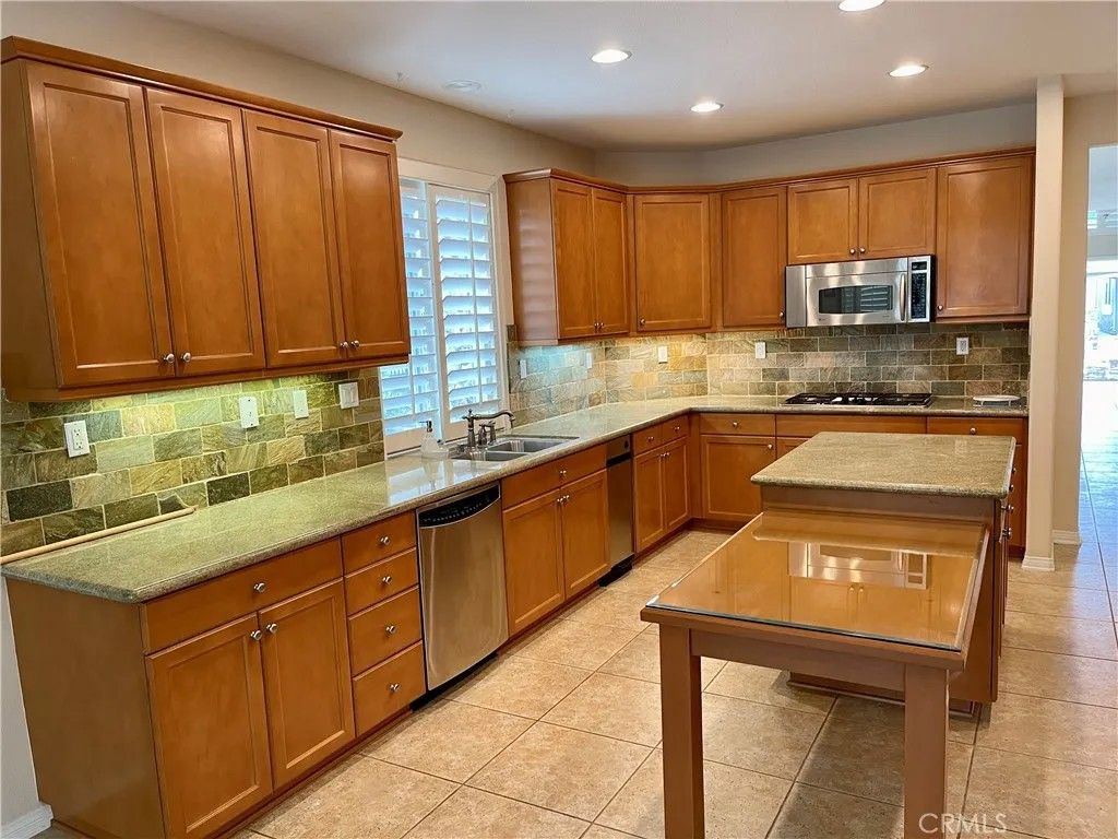 Photo of 20751 Lugano Way, Porter Ranch, CA 91326 (MLS # SR25280475)