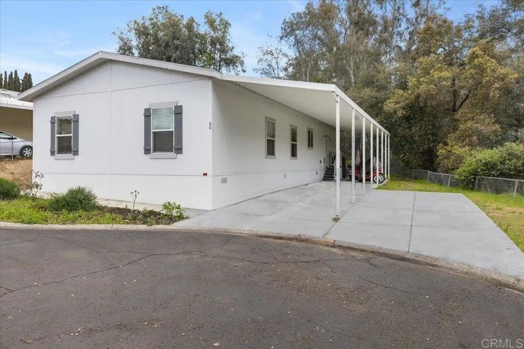 Photo of 13450 Highway 8 Business Spc 60, Lakeside, CA 92040 (MLS # PTP2508555)