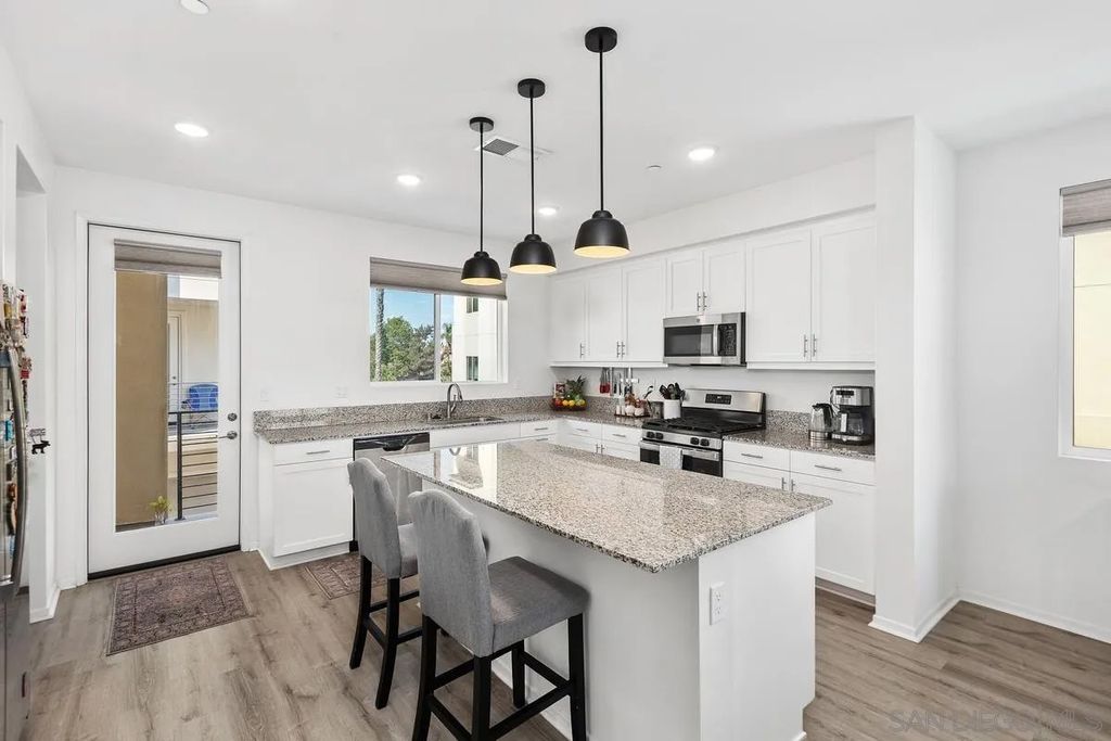 Photo of 5405 Beach Bluff Ln #224, San Diego, CA 92154 (MLS # 250044279)