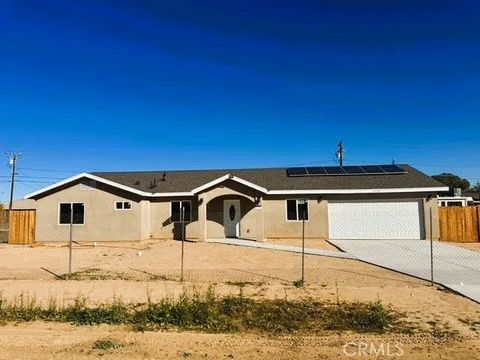 Photo of 9348 S. Loop Boulevard, California City, CA 93505 (MLS # DW25275791)