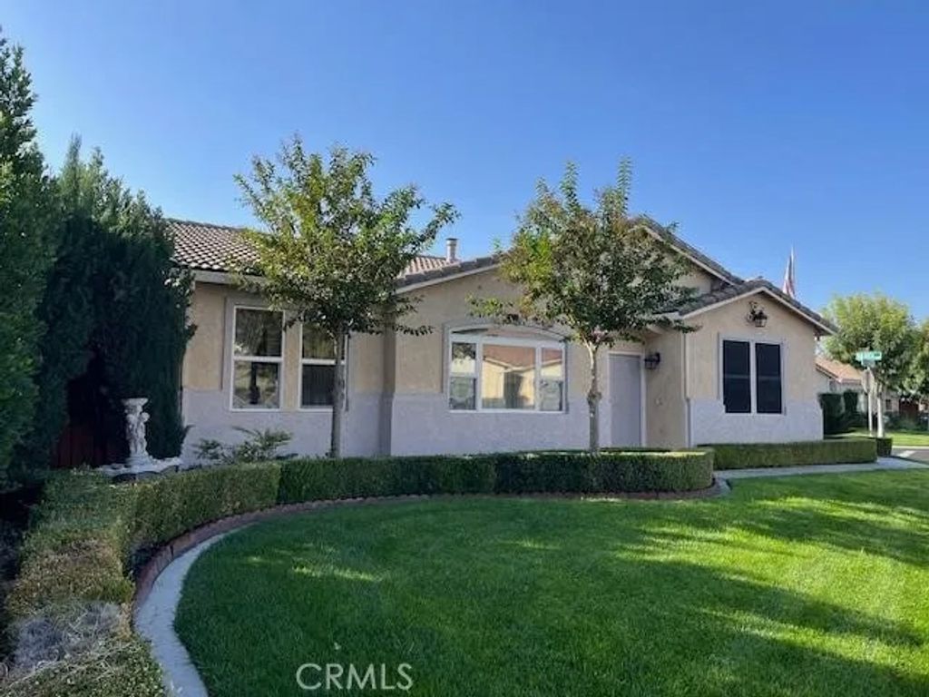 Photo of 812 Via Rosa, Los Banos, CA 93635 (MLS # FR25271491)