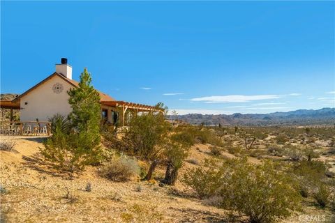 Photo of 5517 Bartlett Mountain Road, Joshua Tree, CA 92252 (MLS # JT26037997)