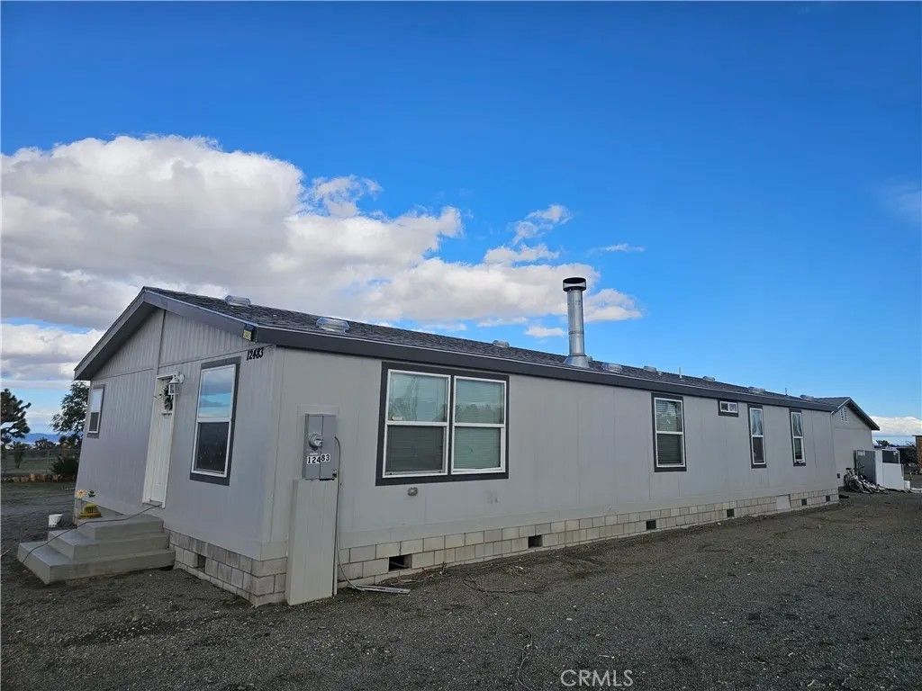 Photo of 12483 Buckwheat Rd, Pinon Hills, CA 92371 (MLS # IV26000156)