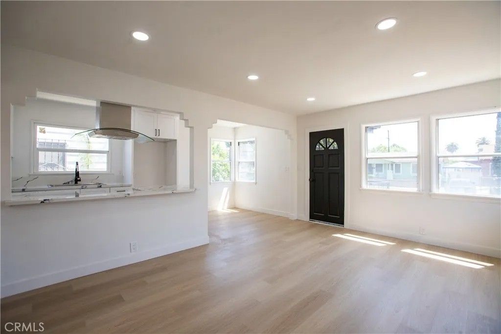 Photo of 1547 W 60th St, Los Angeles, CA 90047 (MLS # DW26088653)