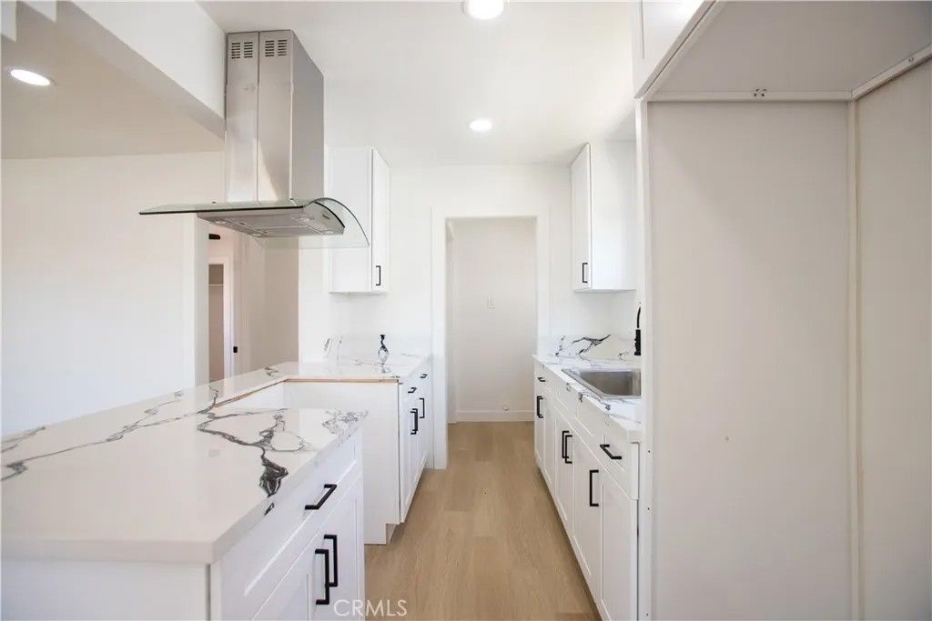 Photo of 1547 W 60th St, Los Angeles, CA 90047 (MLS # DW26088653)