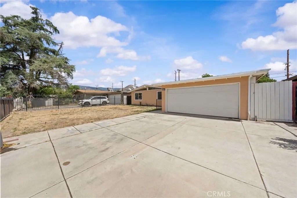 Photo of 7115 Newbury Ave, San Bernardino, CA 92404 (MLS # IV26088664)