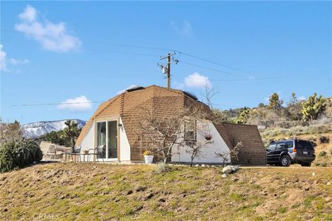 Photo of 8322 Lebec Road, Pinon Hills, CA 92372 (MLS # HD26033561)