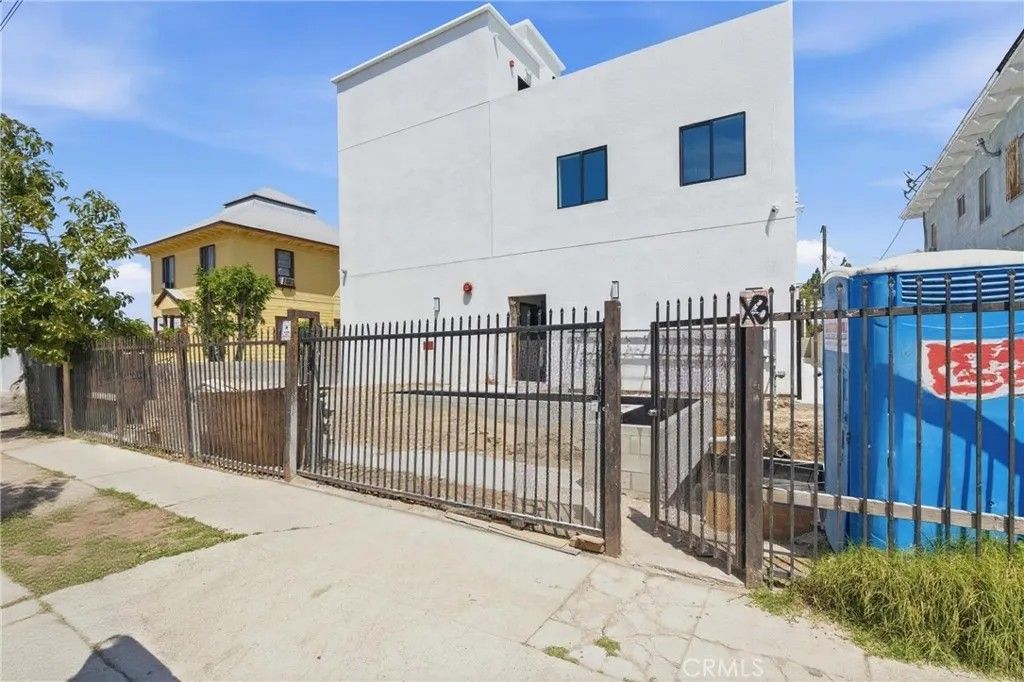 Photo of 1009 E 29th Street, Los Angeles, CA 90011 (MLS # SB26084832)