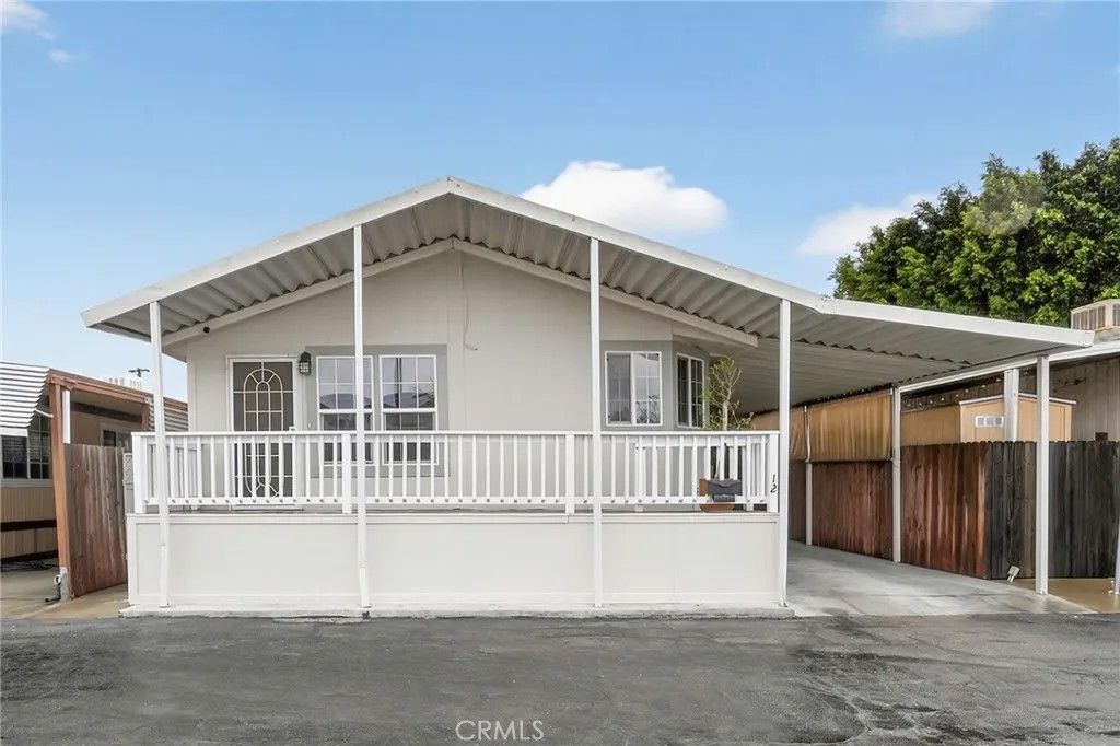 Photo of 21111 Dolores St #12, Carson, CA 90745 (MLS # PW26033135)