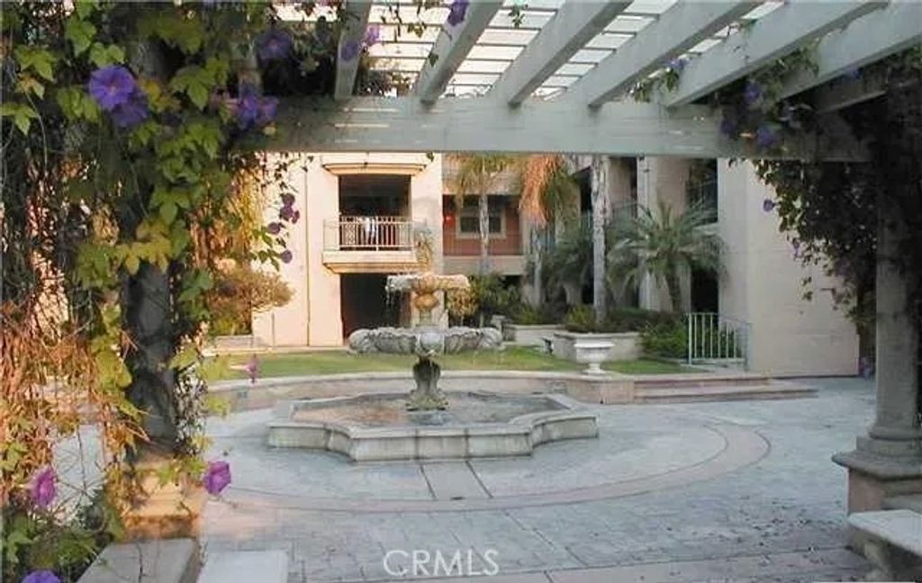 Photo of 5142 Warner Ave #205, Huntington Beach, CA 92649 (MLS # OC25239799)
