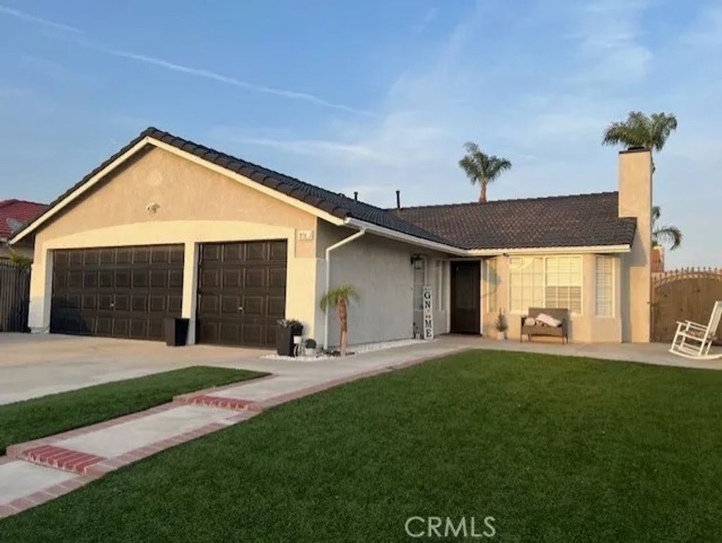Photo of 9765 Venus Lane, Fontana, CA 92335 (MLS # HD26083514)