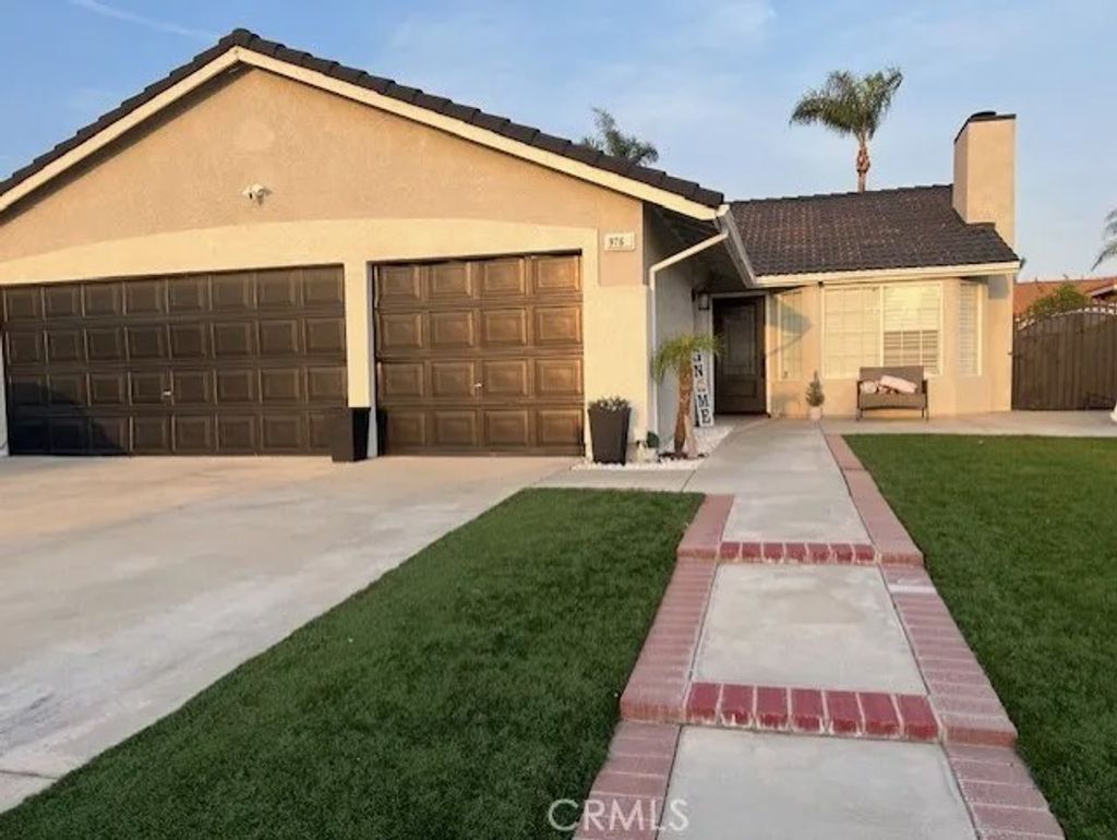 Photo of 9765 Venus Lane, Fontana, CA 92335 (MLS # HD26083514)