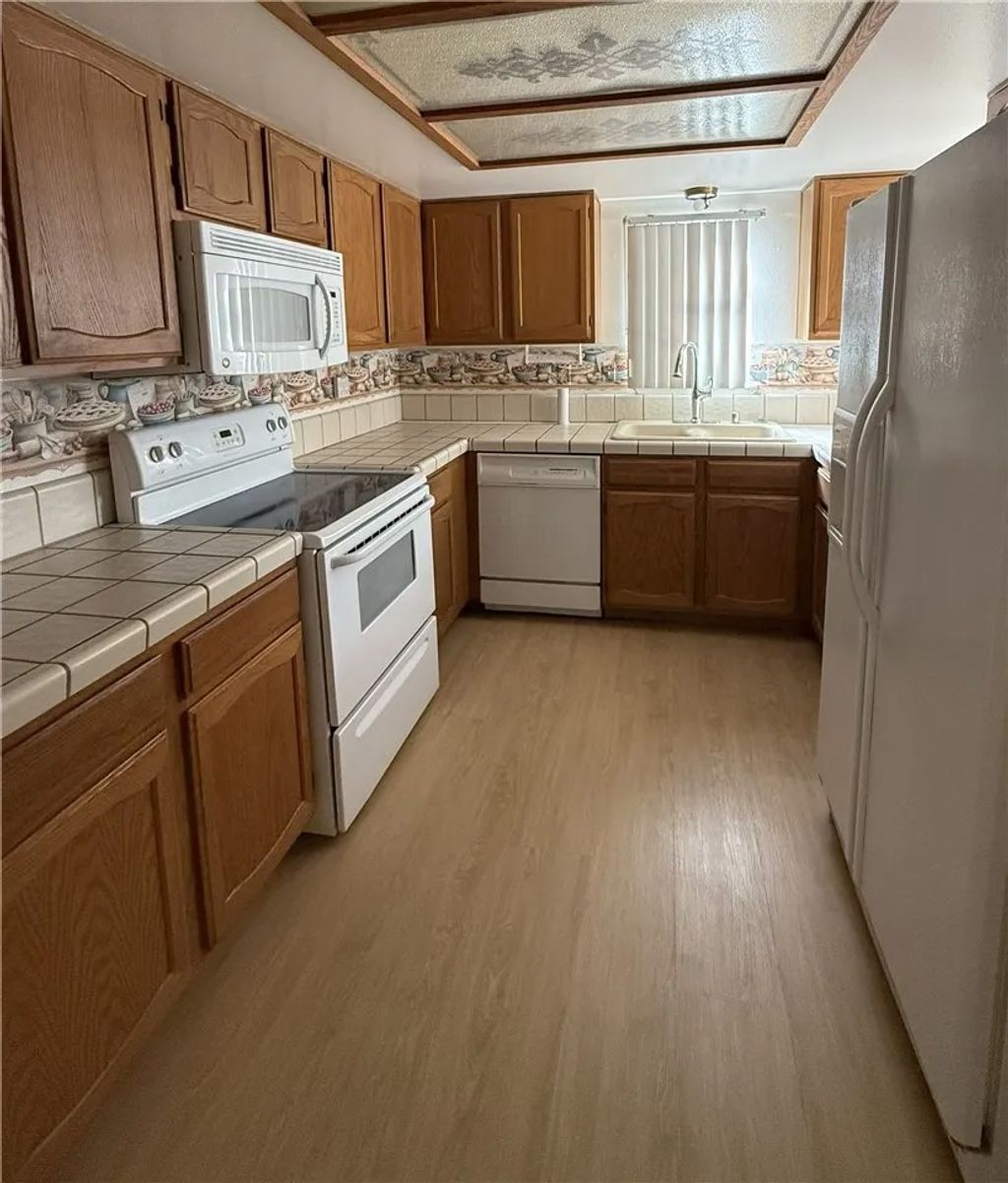 Photo of 19248 Palm Way, Apple Valley, CA 92308 (MLS # HD26058243)