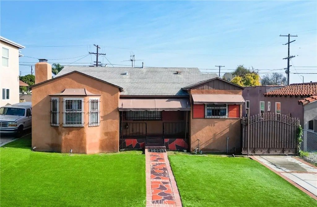 Photo of 10520 Ruthelen, Los Angeles, CA 90047 (MLS # DW25281142)