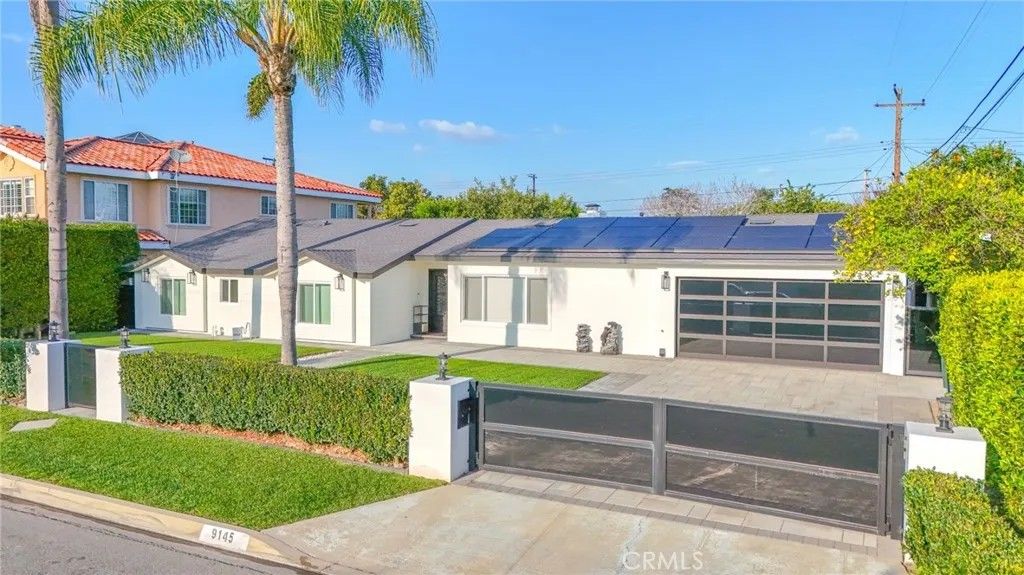 Photo of 9145 Raviller Drive, Downey, CA 90240 (MLS # DW26017733)